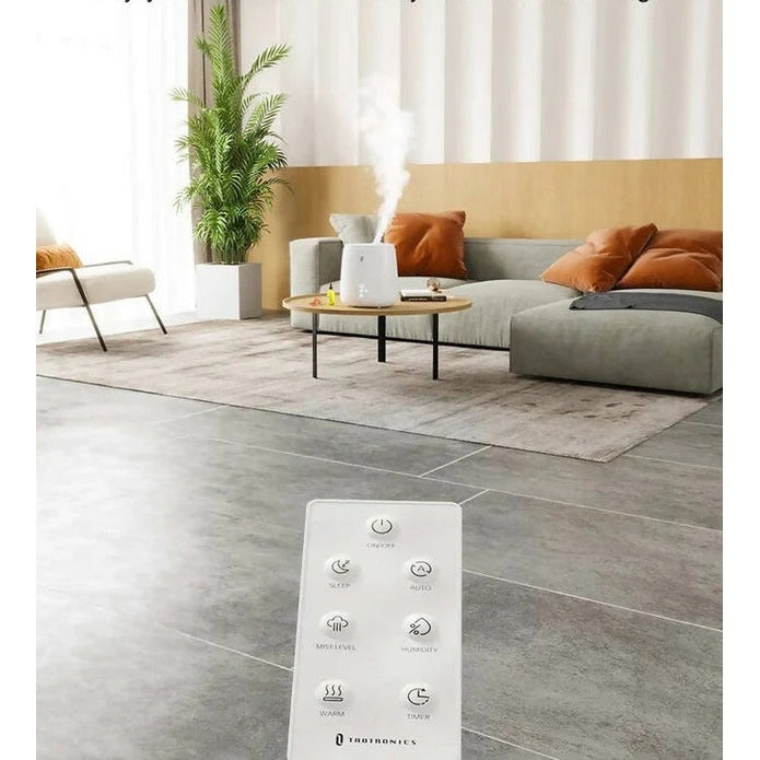 TaoTronics 6L Ultrasonic Humidifier, cold and warm mist, steaming in a bright living room with a nearby remote.