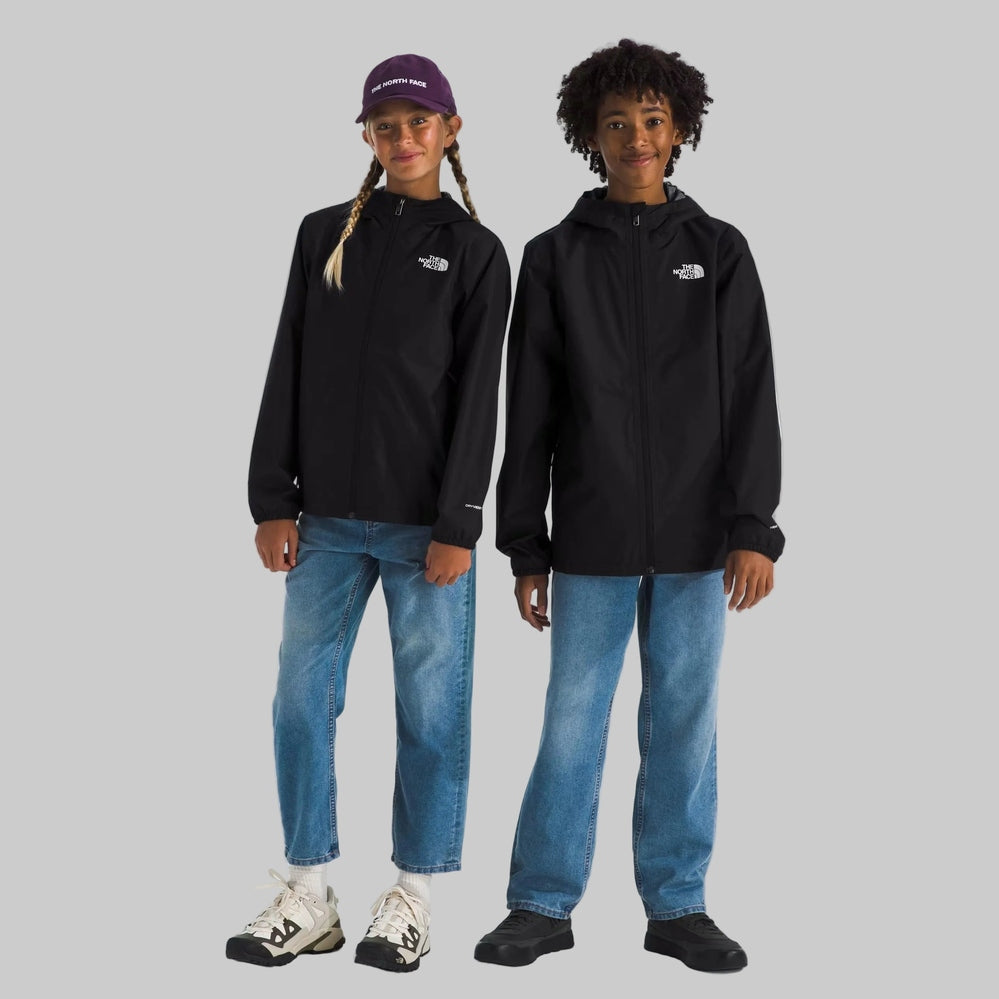 The North Face Zipline Rain Jacket in Black, front view on two kids wearing blue jeans.