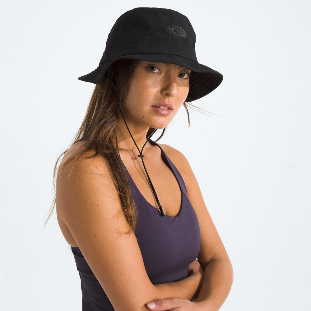 The North Face Horizon Bucket Hat in Black with adjustable chin strap