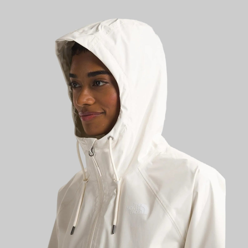 The North Face Women's Antora Rain Hoodie in White with drawstrings, hood up.
