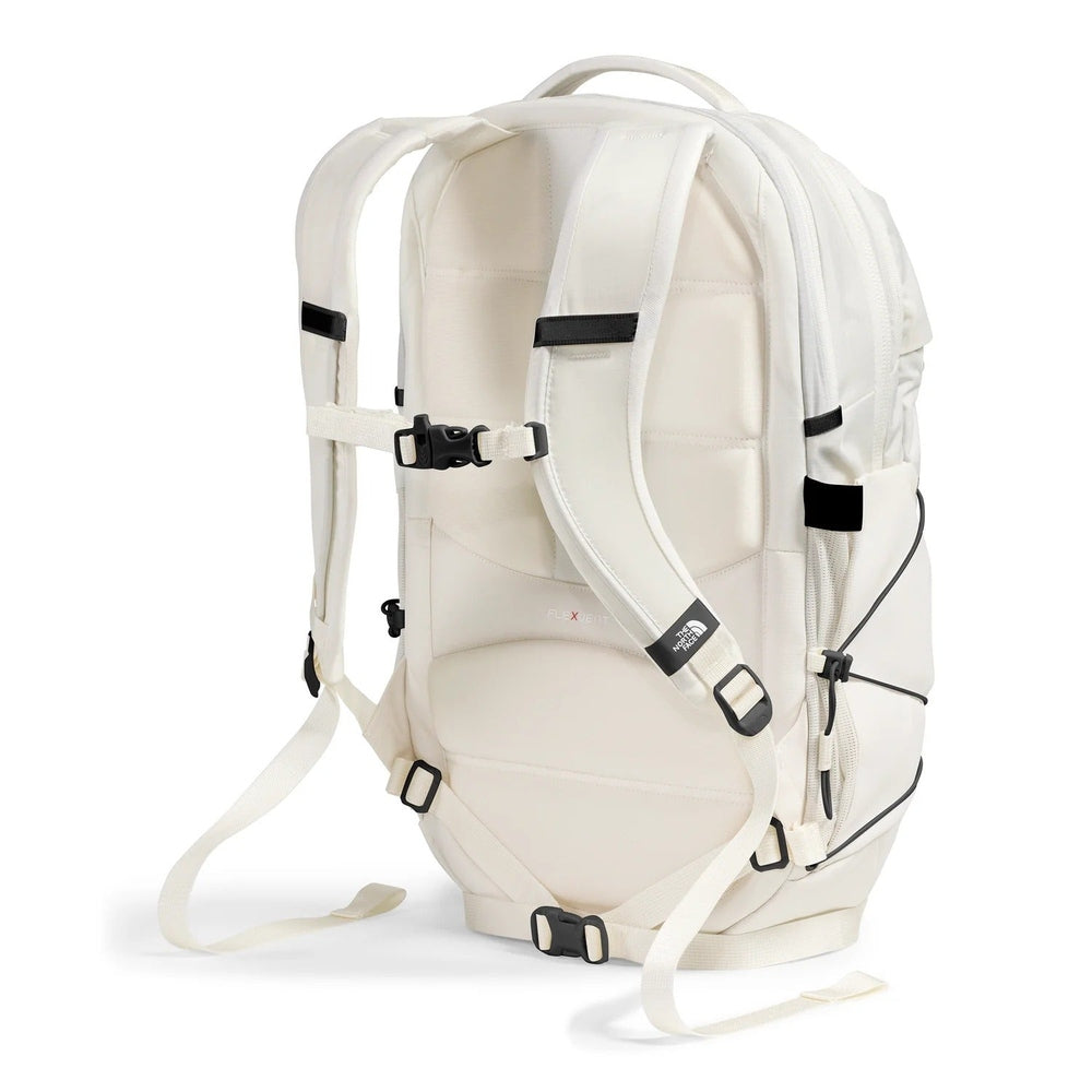 The North Face Borealis Backpack in Cream with black buckles, padded back, and side pocket.