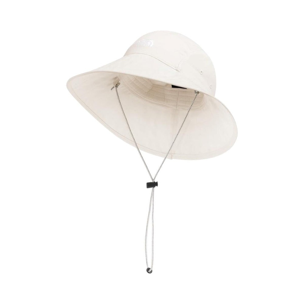The North Face Class V Brimmer Hat in Cream with adjustable chin cord.