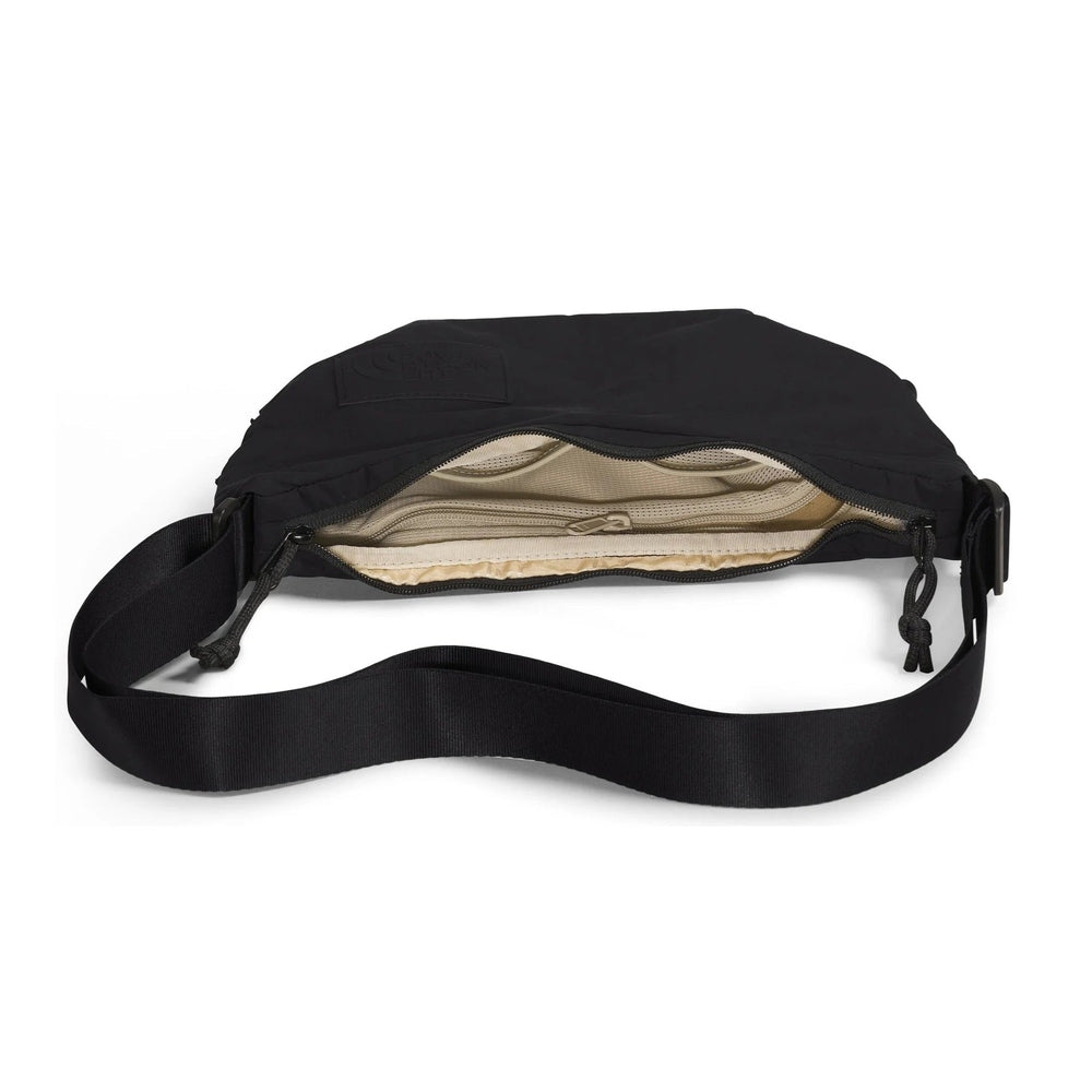 The North Face Never Stop Crossbody Bag in Black with Beige interior and adjustable strap.