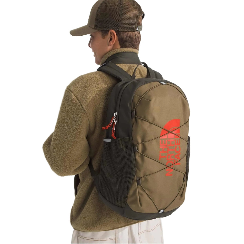 The North Face Youth Court Jester Backpack in Tan with black accents, red logo, side view