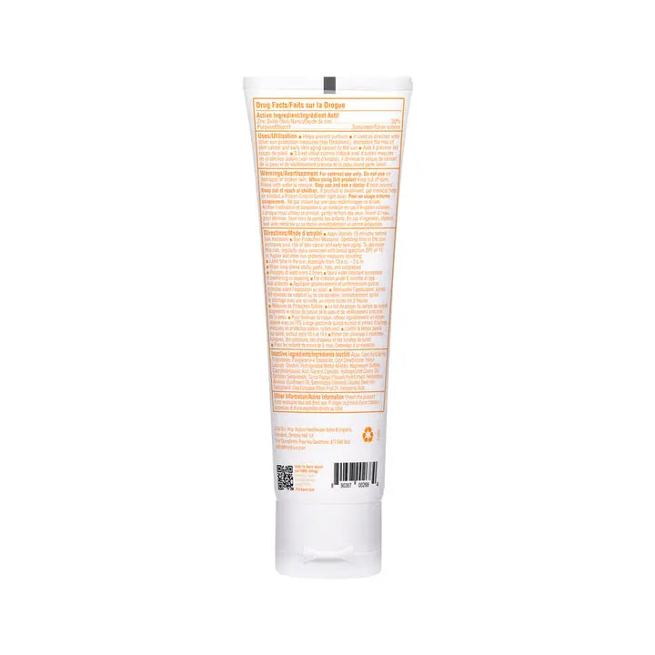 THINK Baby Mineral Based Sunscreen SPF50 tube standing upright on white surface with orange label and visible ingredient text.
