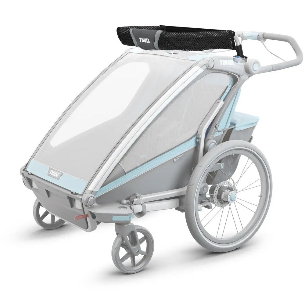 Thule Cargo Rack, light gray with blue trim, attached to a compact stroller frame ready for transport