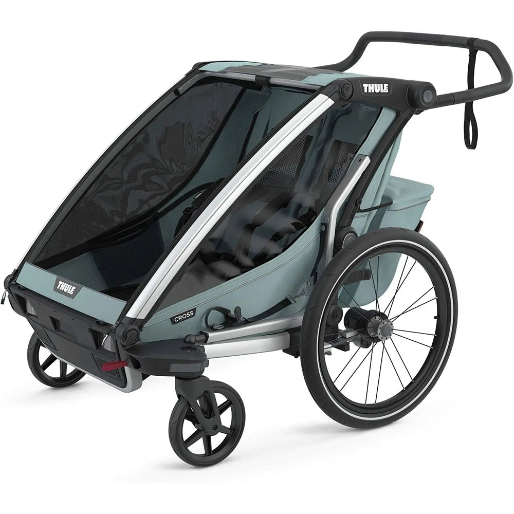 Thule Chariot Cross Multisport bike trailer Alaska Blue with canopy and large wheels, ready for outdoor rides.