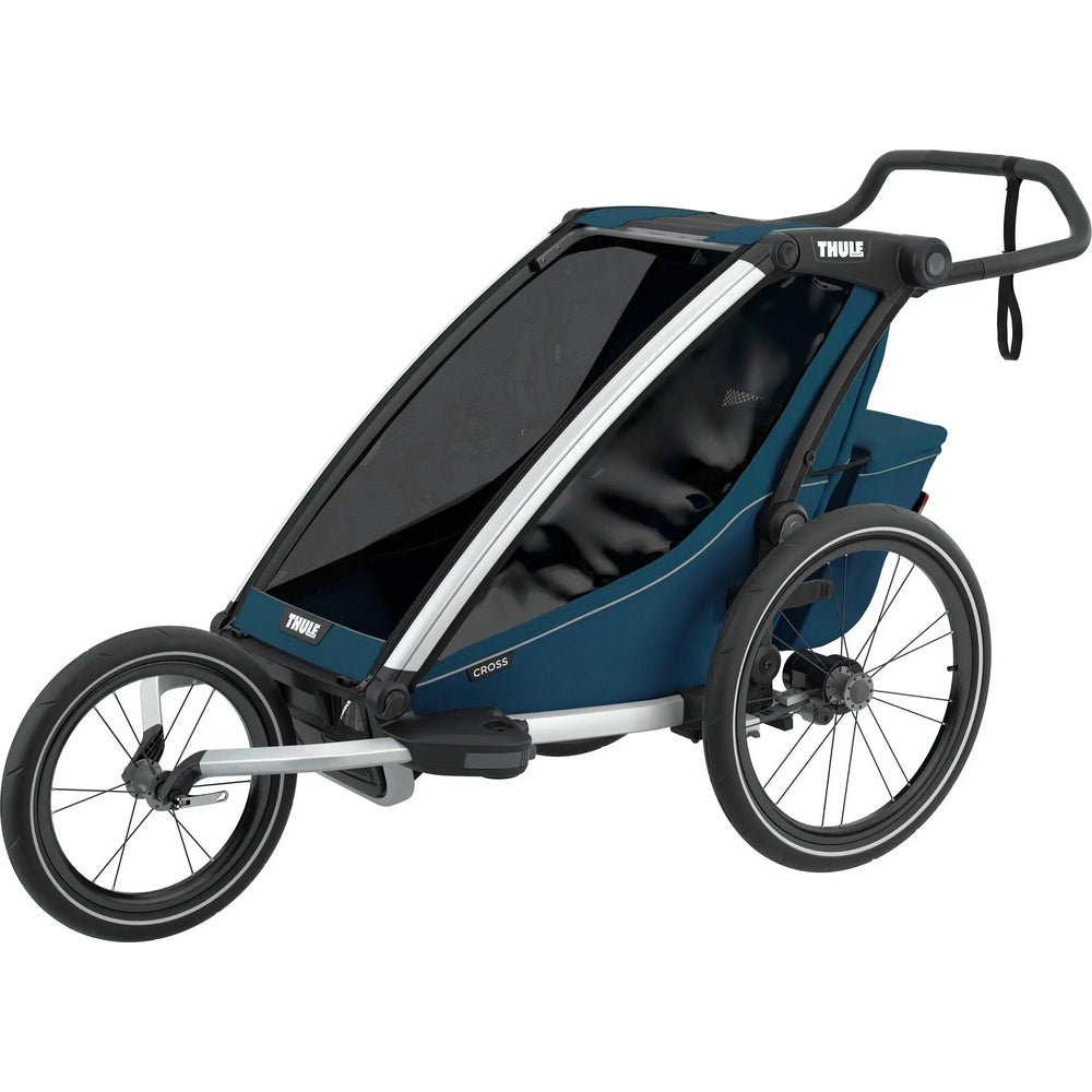 Thule Chariot Cross Multisport Bike Trailer Majolica Blue, rugged black frame with large wheels ready for cycling.