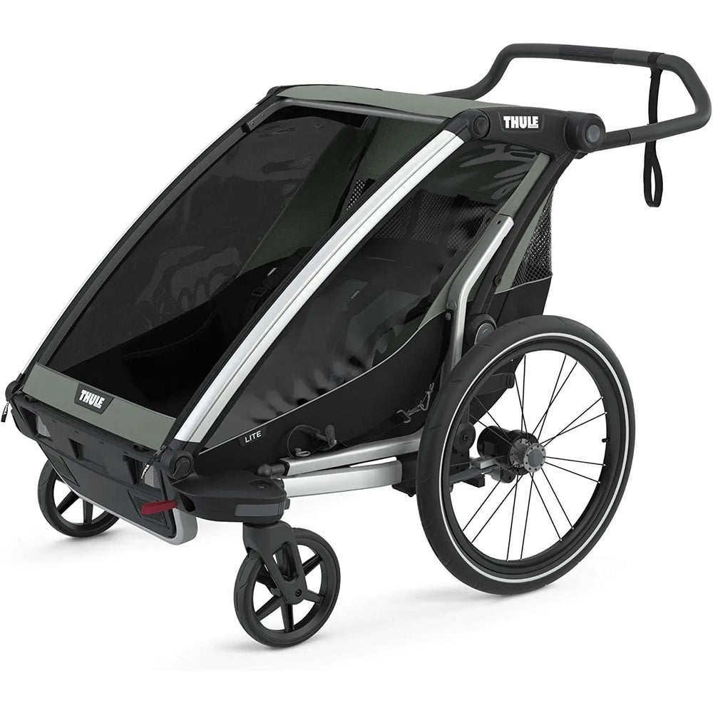 Thule Chariot Lite Multisport bike trailer in agave green with silver frame, large wheels, and mesh canopy.