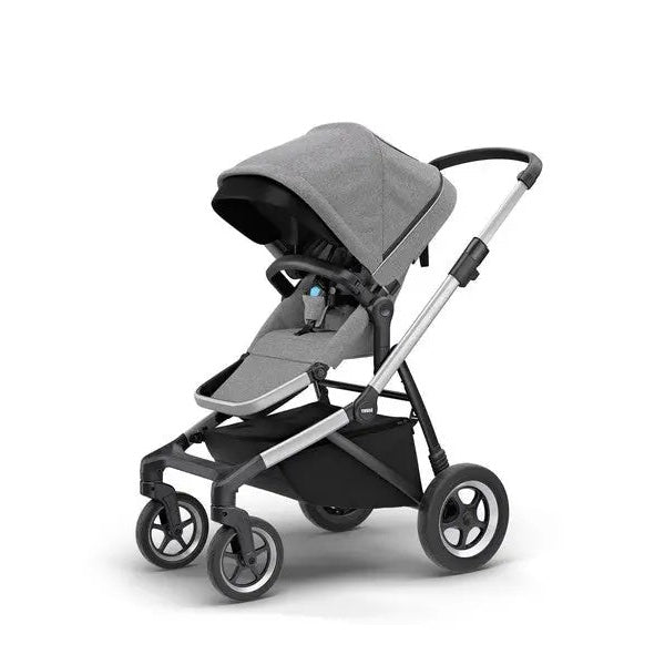Thule Sleek Stroller in gray fabric with extended canopy, aluminum frame, and visible storage basket