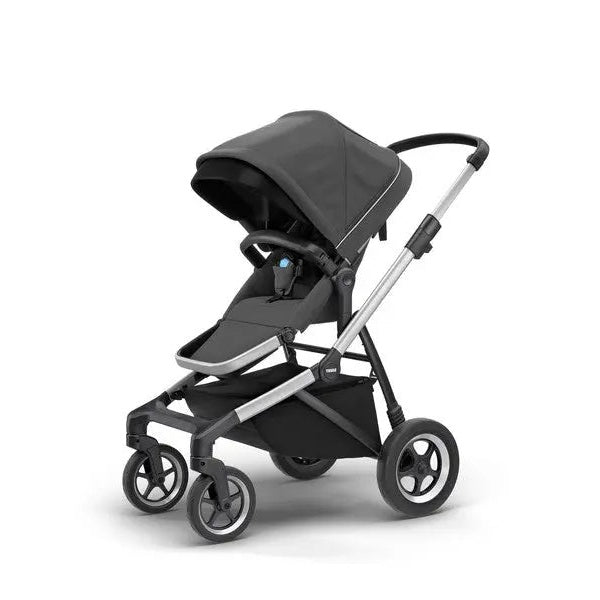 Thule Sleek Stroller in black canopy and gray seat with aluminum frame, ready for a city stroll.
