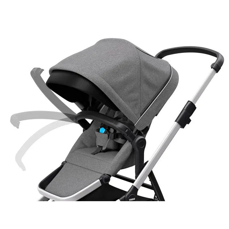 Thule Sleek stroller in grey with padded seat and canopy, shown with adjustable handlebars and reclined seat.