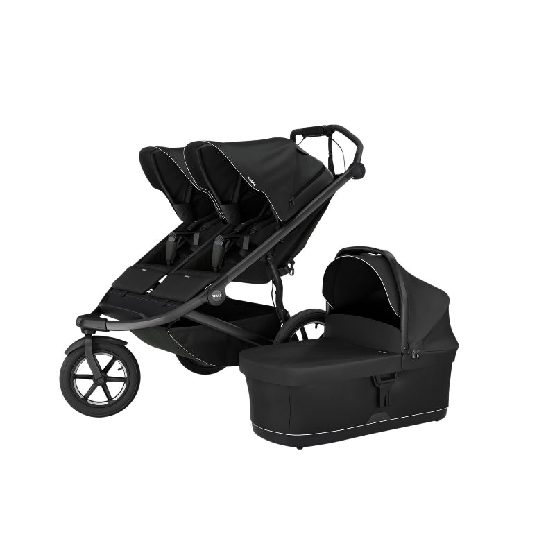 Thule Urban Glide 3/4 black stroller with bassinet, showcasing a detachable bassinet for newborns.