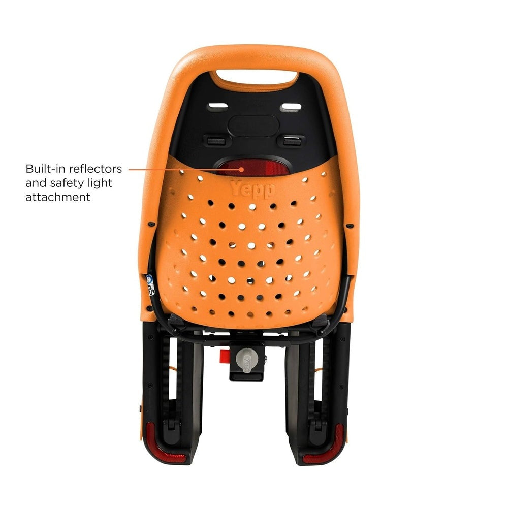 Thule Yepp Maxi Rack Mounted Child Bike Seat, orange perforated shell with reflectors and light attachment