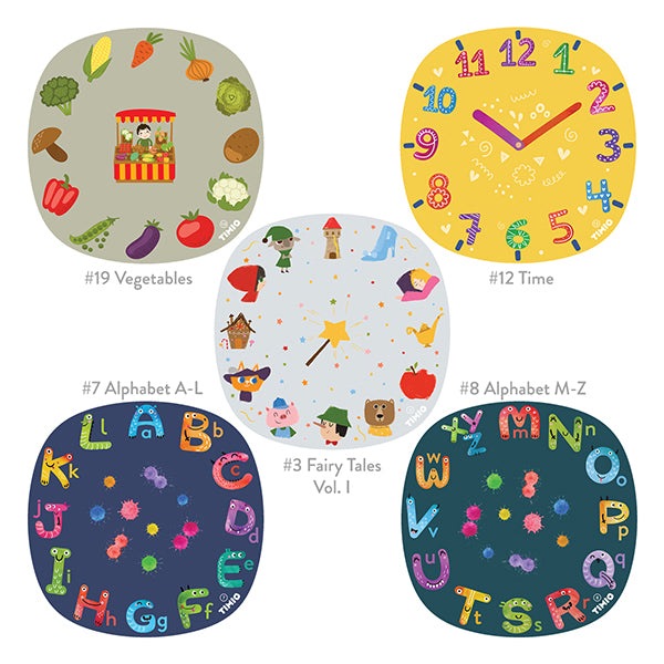 Timio Disc Set 3 with five colorful discs featuring vegetables, time, alphabets, and fairy tales