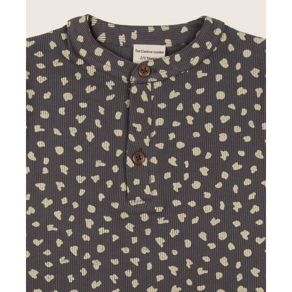 Turtledove London Animal Print Short Set Charcoal top; close-up shows charcoal fabric, white spots, and brown buttons.