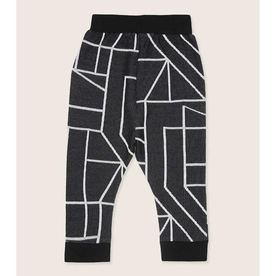 Turtledove London Geo Jacquard Harems for babies in charcoal gray with white geometric lines; elastic waistband shown.
