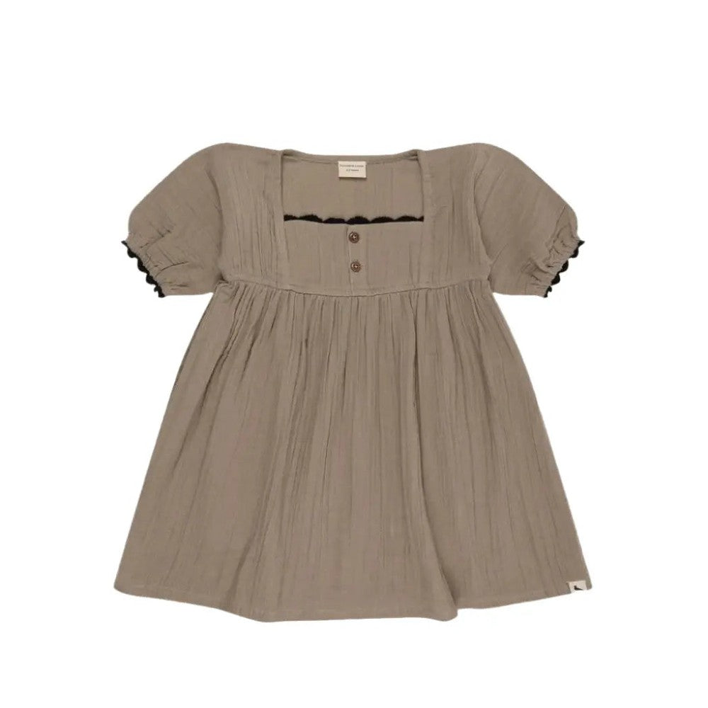 Turtledove London Herb Gauze Dress laid flat in beige gauze with puff sleeves and front buttons.