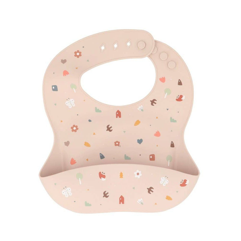Tutete baby silicone bib in soft pink with floral print and front pocket
