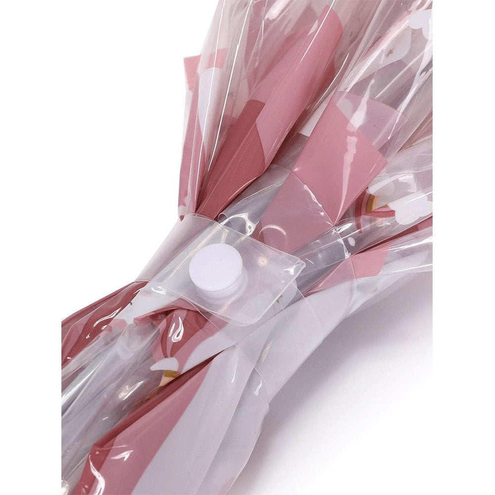 Tutete kids umbrella pink in clear plastic packaging with white snap button clasp
