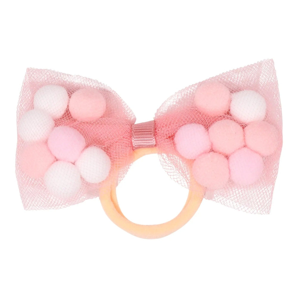 Tutu Joli LLC 2Pc Pom Pom Hair Ties With 4" Bow in pink netting, shown on a soft orange elastic ponytail holder.