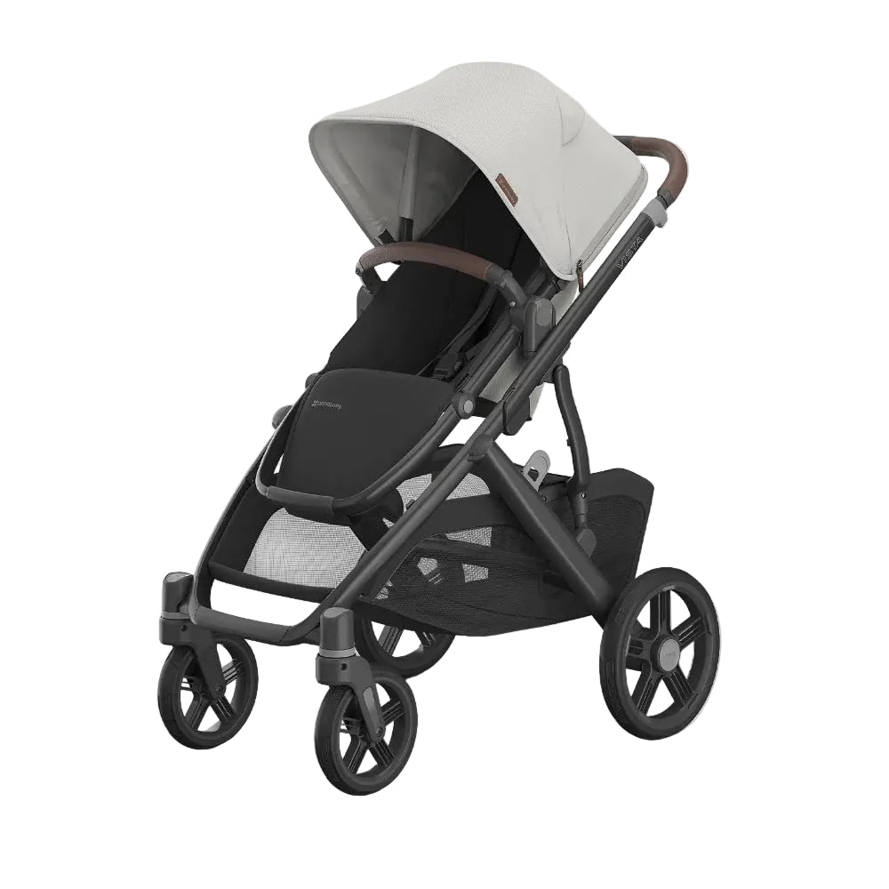 UPPAbaby Vista V3 stroller in Savannah fashion being pushed during a family stroll.