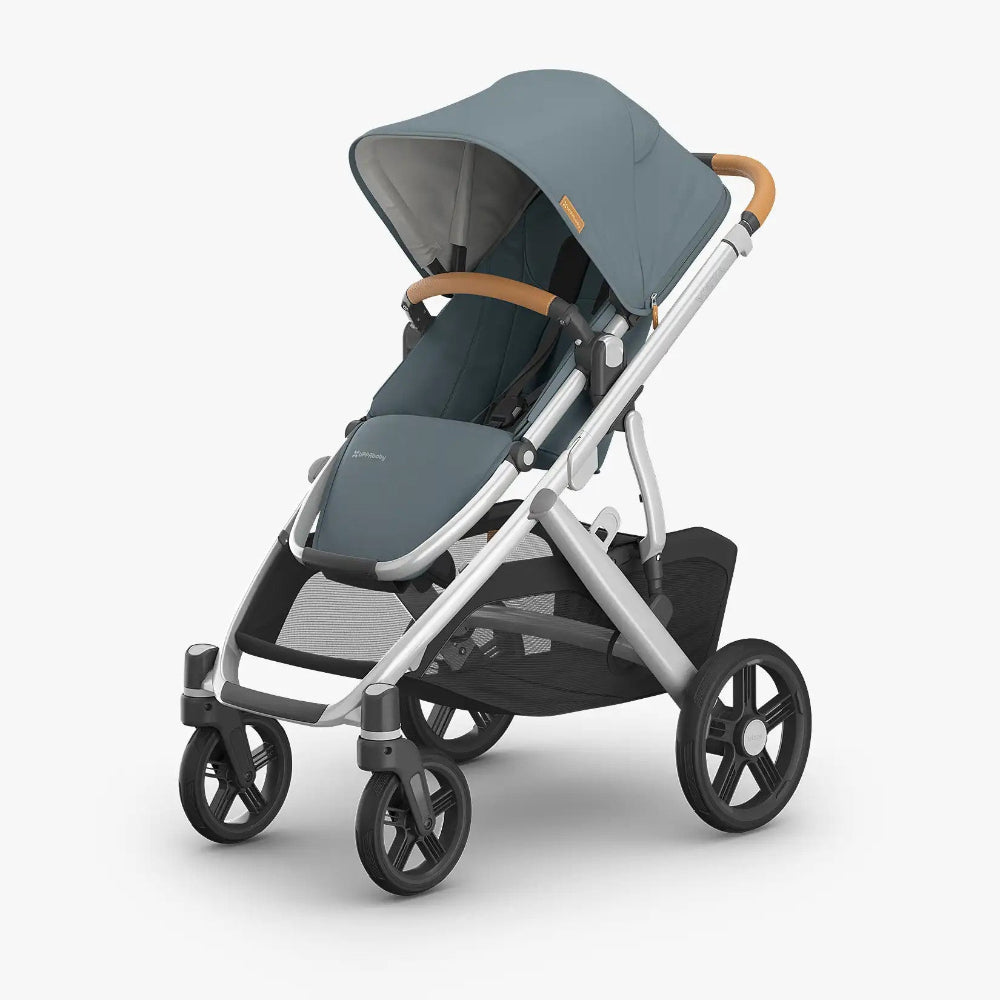 UPPAbaby Vista V3 stroller in Callum fashion with tan leather handlebar.