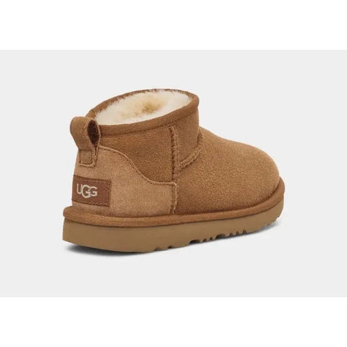 UGG Kid's Classic Ultra Mini Chestnut boot, chestnut suede with shearling lining; rear view shows pull tab.