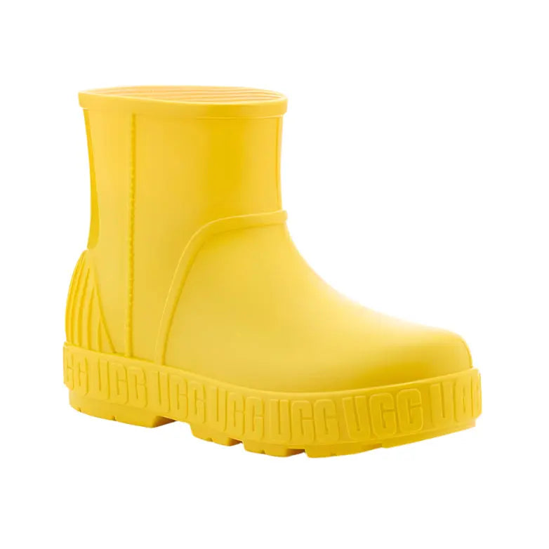 UGG Kid's Drizlita Canary yellow rain boot for kids with a chunky ribbed sole and pull-tab.