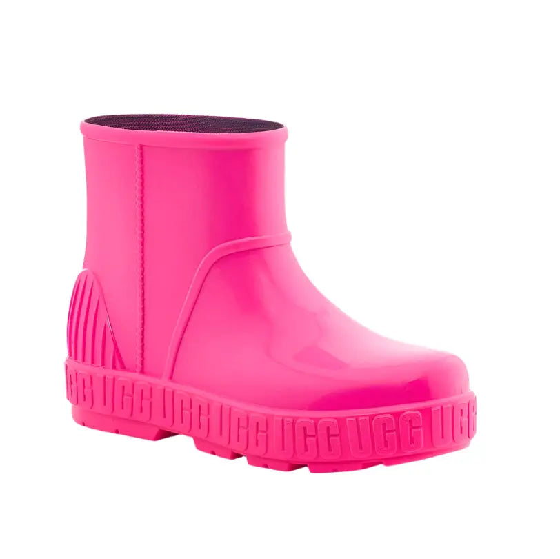 UGG Kid's Drizlita Taffy Pink waterproof ankle boot, bright pink rubber sole with chunky tread.
