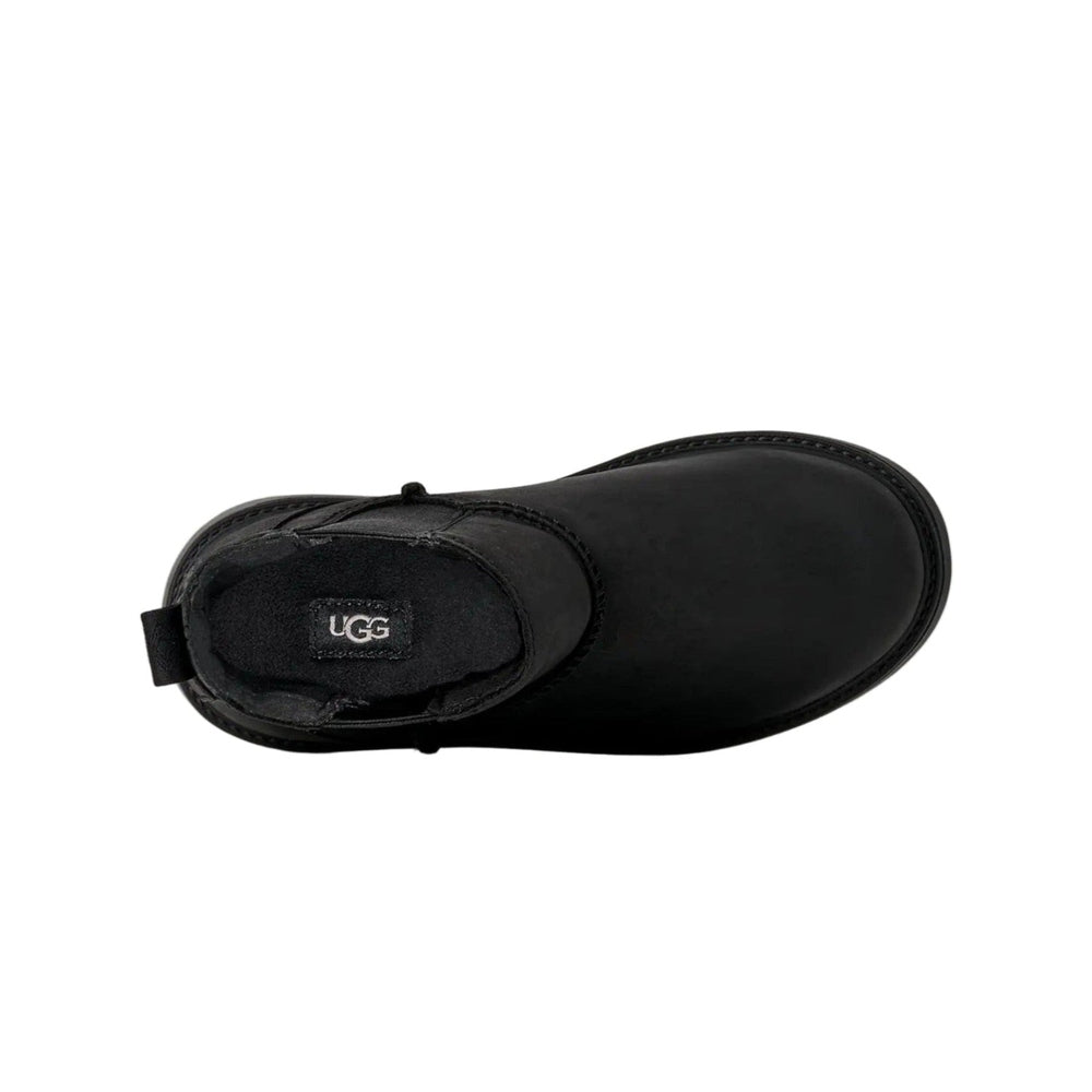 UGG Kids' Perry Weather Chelsea Black boot seen from above, with back pull tab and cozy lining.