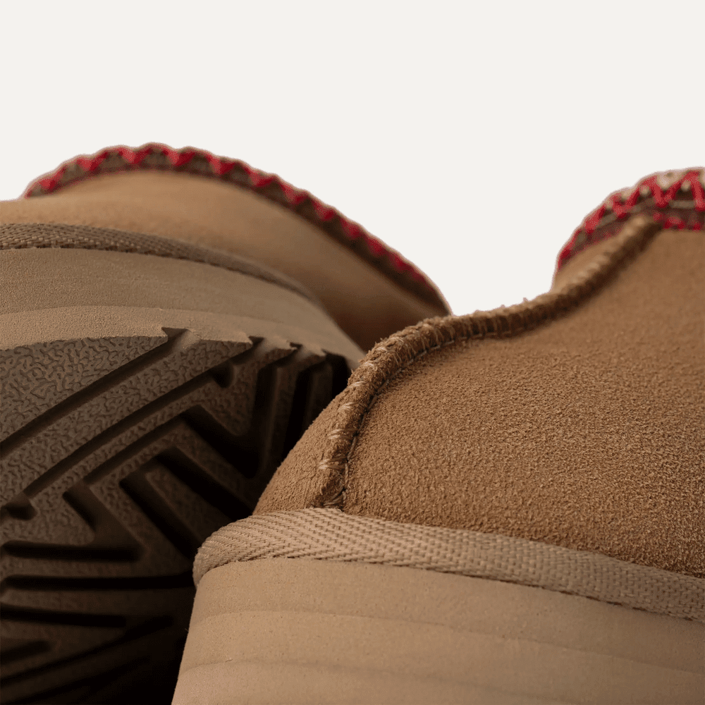 UGG Kids' Tazz Chestnut suede sandal with rugged tread sole and reinforced stitching.
