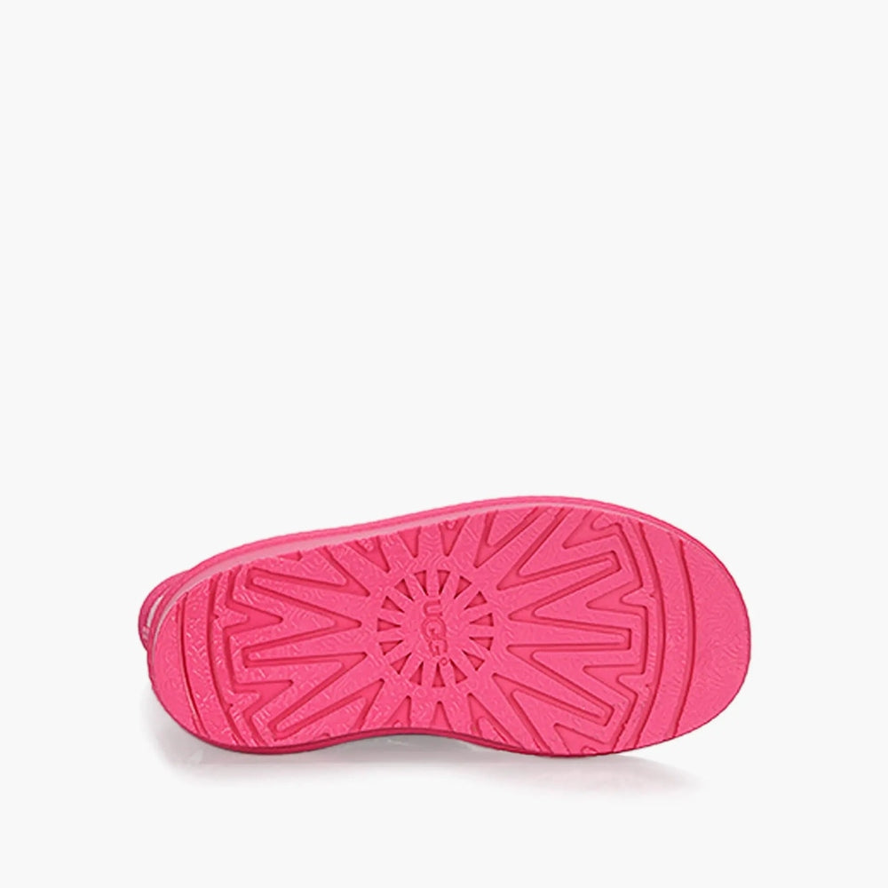 UGG Rahjee Rain Boot Pink; kids' waterproof boot viewed from sole with bright pink textured tread.