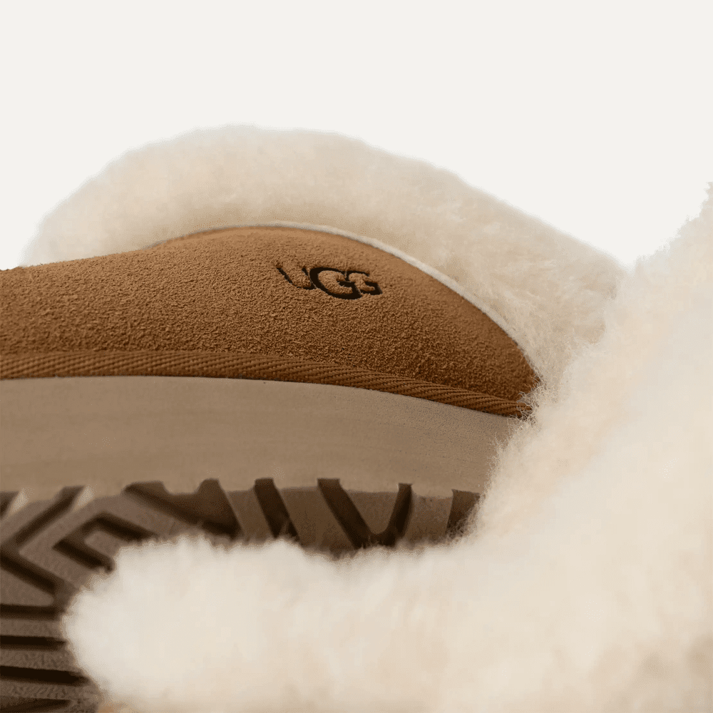 UGG Women's Disquette Chestnut boot, tan suede with plush shearling trim and chunky tread sole.