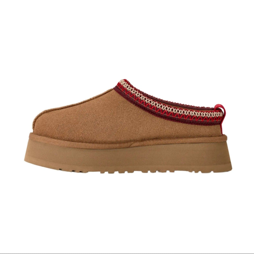 UGG Women's Tazz II Chestnut suede slip-on with red-stitched collar and chunky platform sole.
