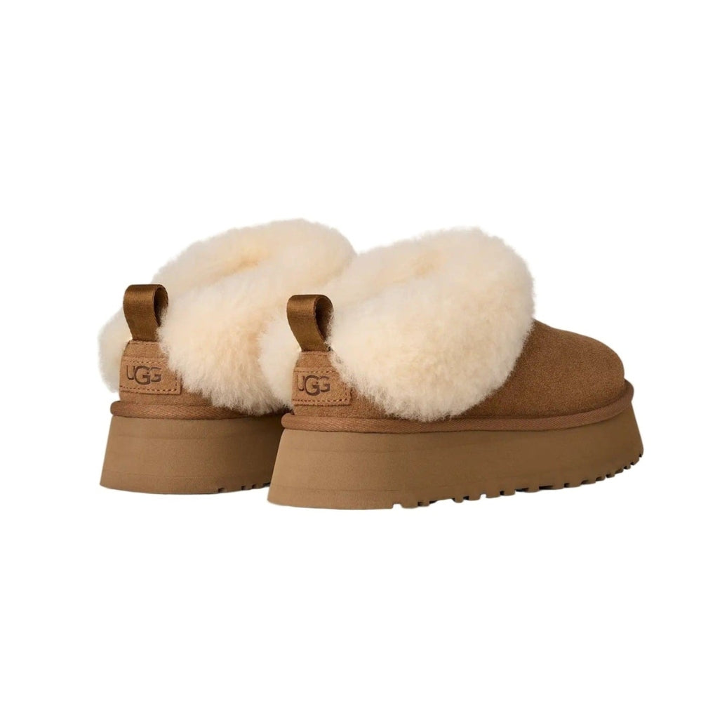 UGG Women's Tazzelle Chestnut suede slip-on sandals with plush cream shearling lining and chunky tan sole.