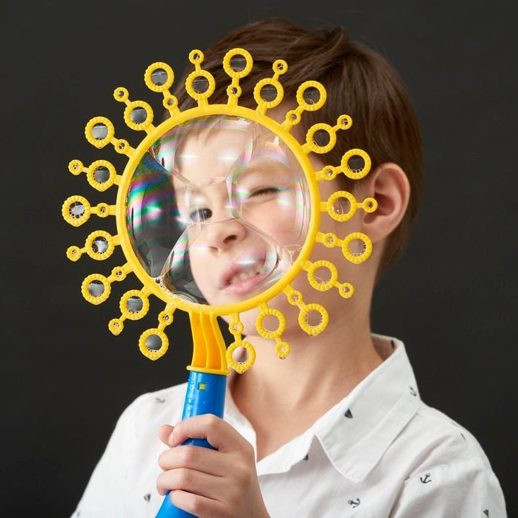 Uncle Bubble Fun Fantasy Wand 4 oz bubble toy with yellow sunburst frame and blue handle