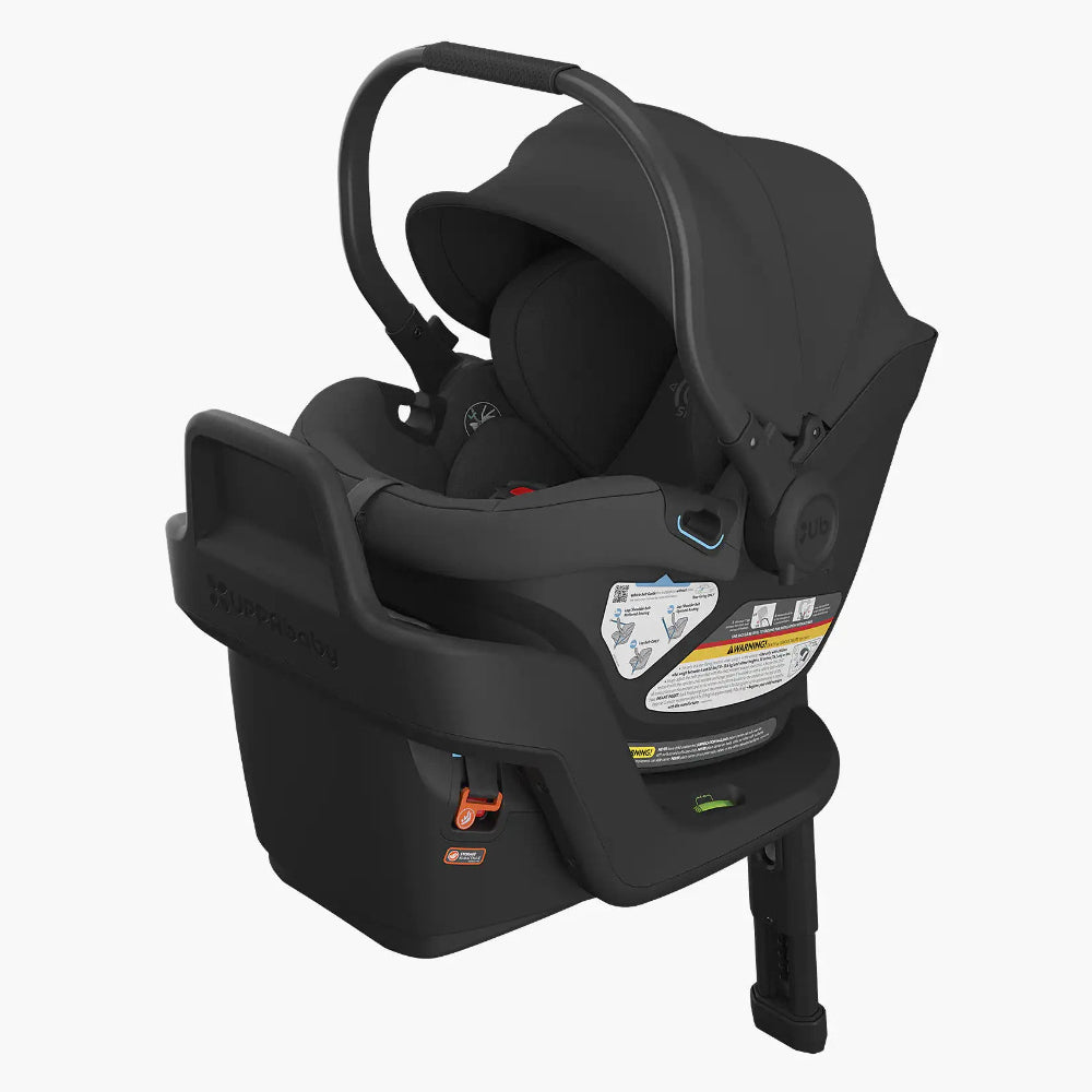 Uppababy Aria Infant Car Seat in black with base attachment and curved carry handle.