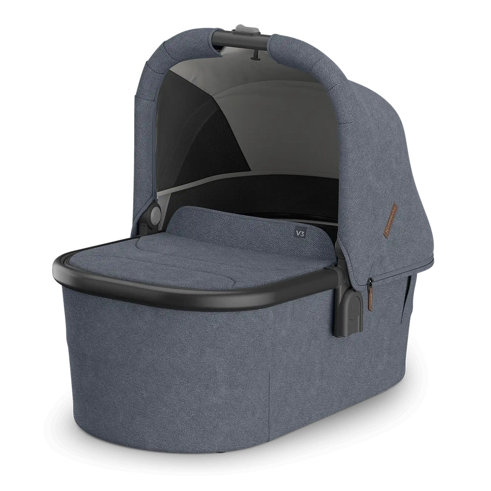 UPPAbaby Bassinet V3 in blue-gray fabric with canopy and padded interior