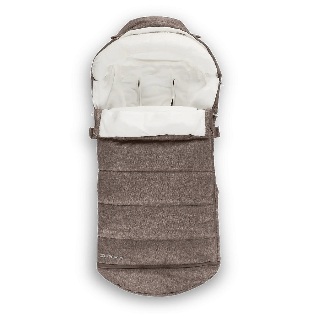 Uppababy Cozy Ganoosh stroller footmuff in brown with white fleece lining, opened to cradle baby.