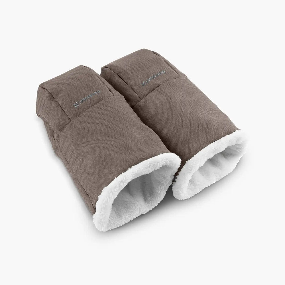 UPPABABY Cozy Handmuffs in taupe with white plush lining, two mitts ready to snap onto a stroller.