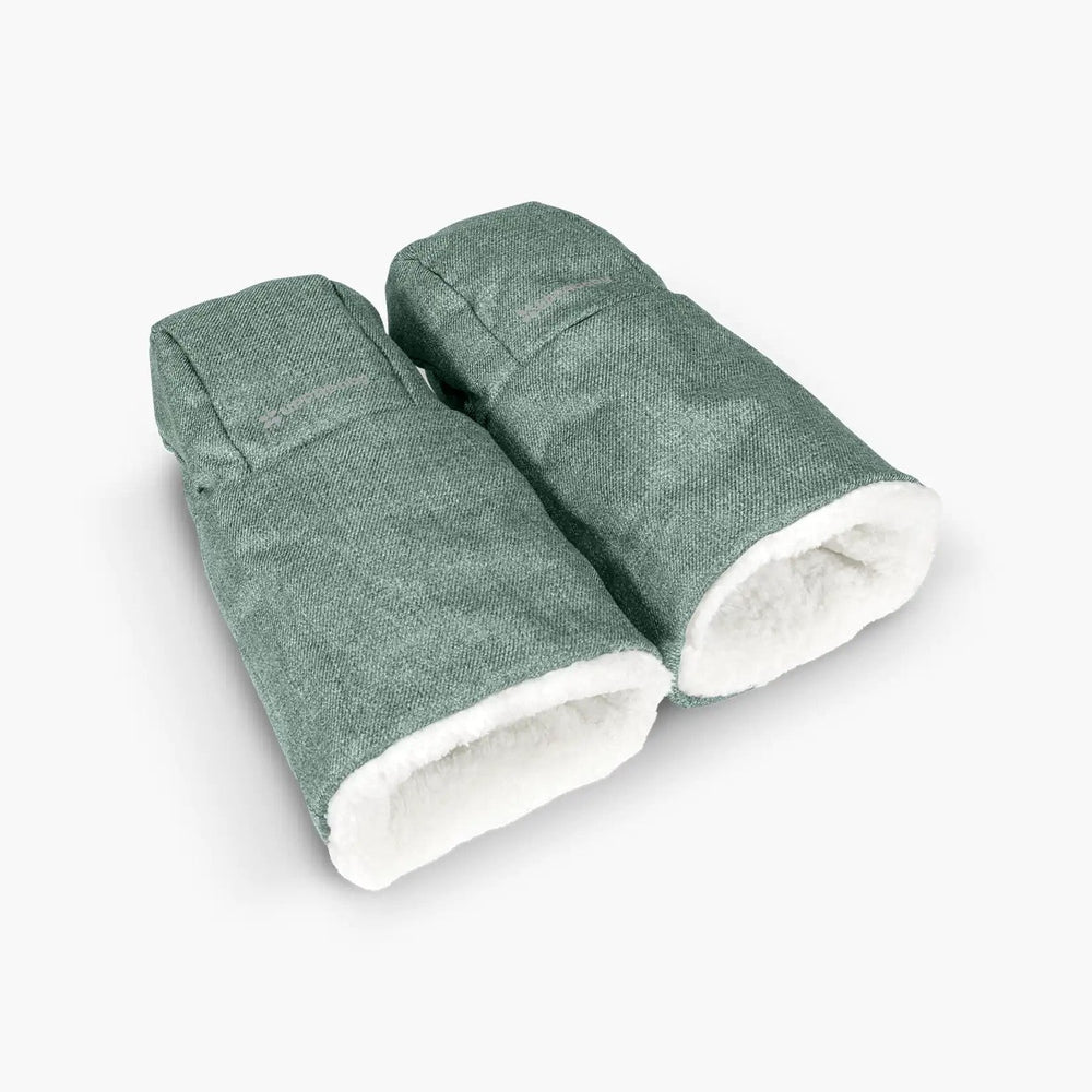 Uppababy Cozy Handmuffs teal pair with white sherpa lining, shown as warm stroller hand covers.