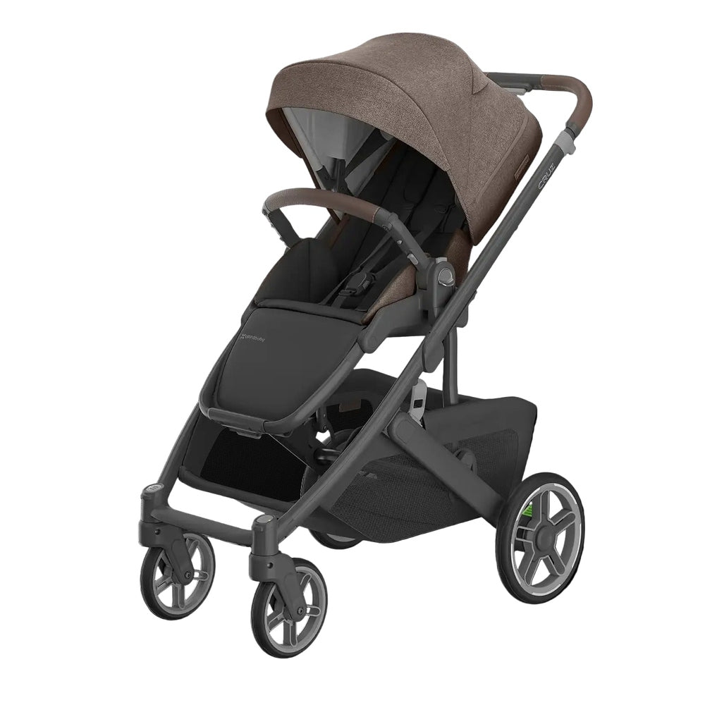 UPPABABY Cruz V3 stroller in brown fabric with canopy, dark frame, and storage basket

