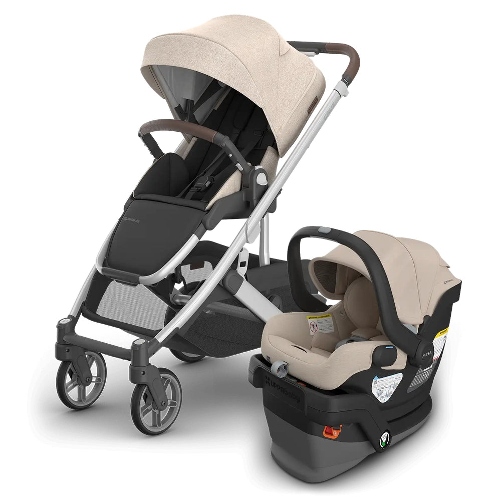 UPPABABY Cruz V3 Stroller + Mesa V3 Infant Car Seat travel system in beige, stroller ready with car seat attached.