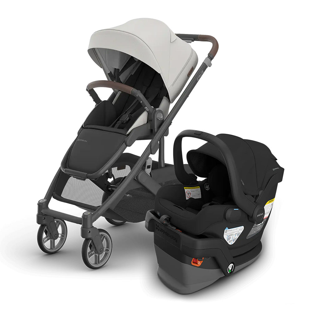UPPABABY Cruz V3 Stroller + Mesa V3 Infant Car Seat travel system in gray/black, car seat attached to the stroller frame.