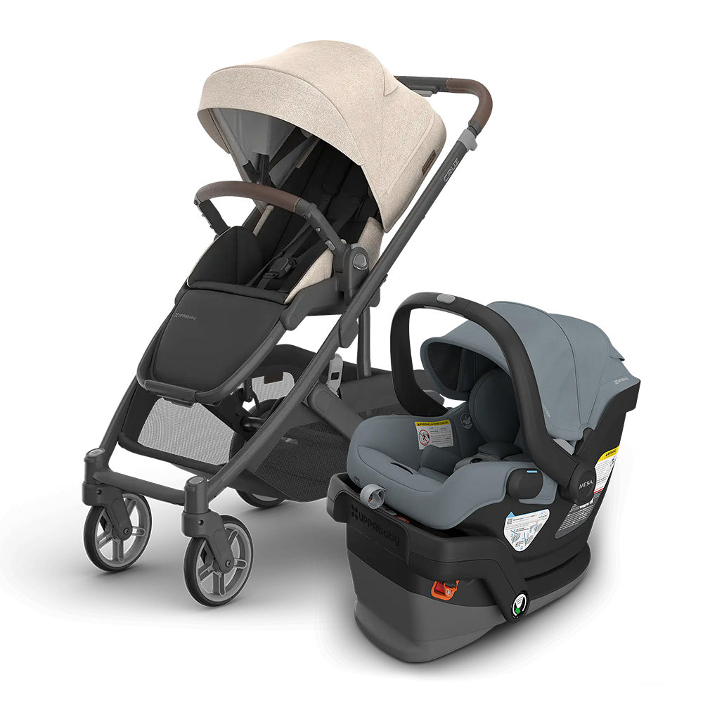 UPPABABY Cruz V3 Stroller + Mesa V3 Infant Car Seat travel system, beige canopy and gray seat, car seat attached beside stroller.
