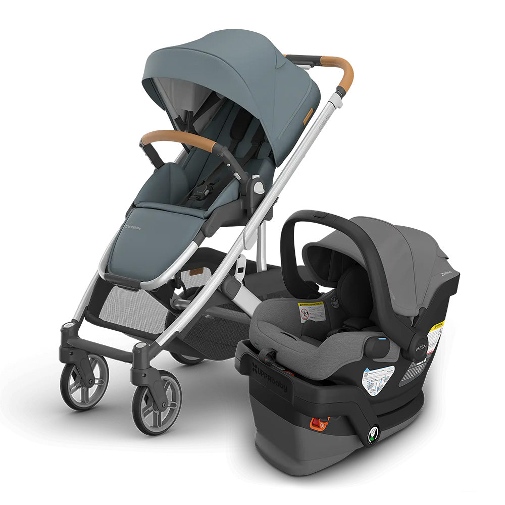Uppababy Cruz V3 Stroller + Mesa V3 Infant Car Seat Travel System, blue-gray stroller with attached car seat for on-the-go.