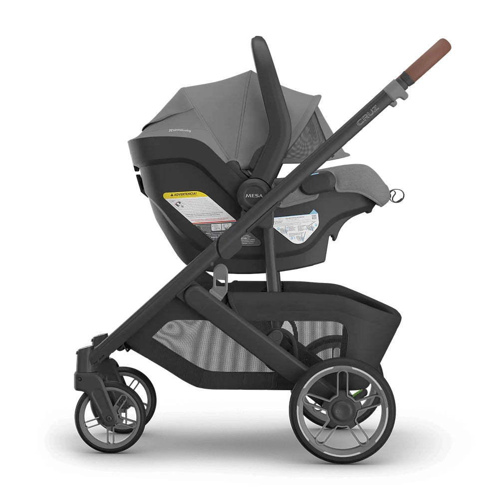 UPPABABY Cruz V3 Stroller + Mesa V3 Infant Car Seat Travel System in gray, with the car seat attached to the frame.