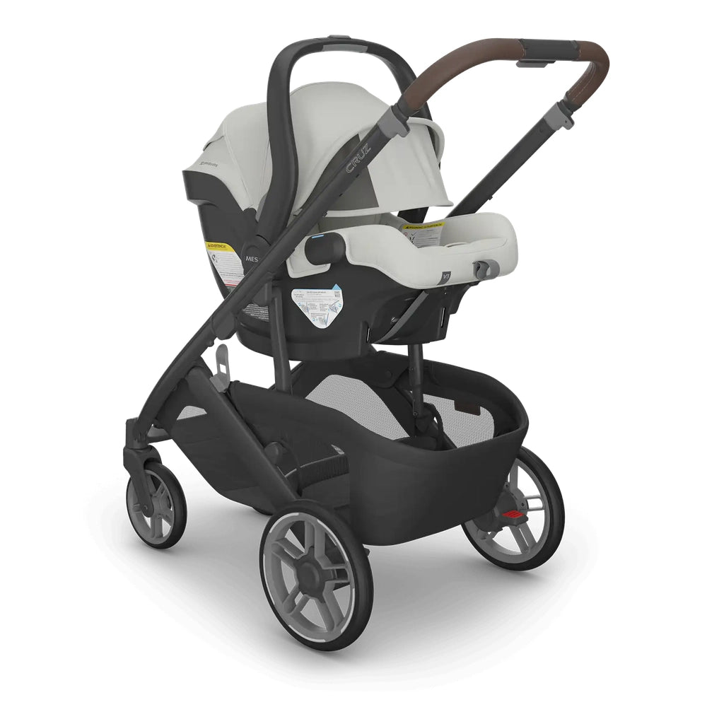 UPPABABY Cruz V3 Stroller + Mesa V3 Infant Car Seat Travel System with beige car seat and black frame.