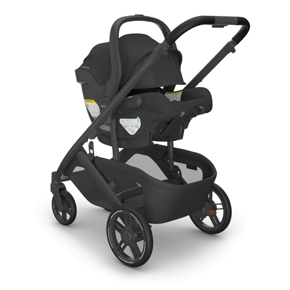 UPPABABY Cruz V3 Stroller + Mesa V3 Infant Car Seat Travel System in black, with the car seat attached to the chassis.